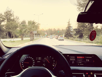 Road seen through car windshield