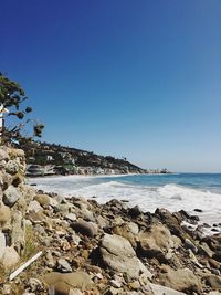 Scenic view of sea against clear sky