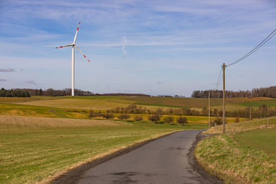 Green energy from wind power requires a power grid and power poles for german energiewende