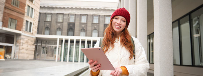 Young woman using mobile phone