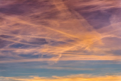 Low angle view of dramatic sky during sunset