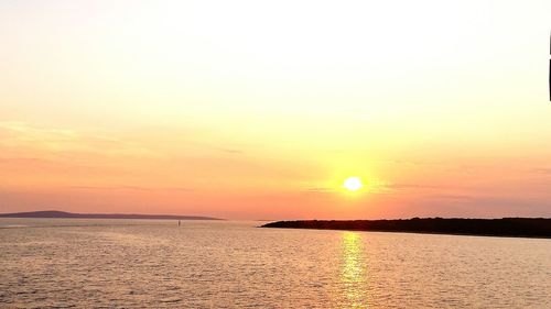 Sunset over calm sea