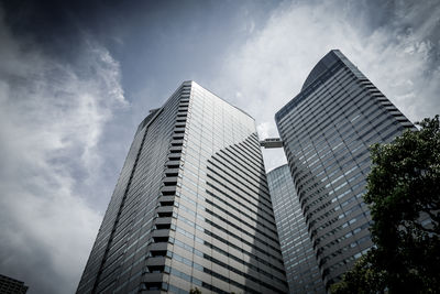 Low angle view of modern buildings against sky