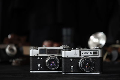 Close-up of camera on table