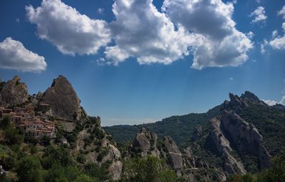 Panoramic view of rocky mountains against sky