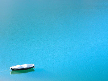 High angle view of boat on calm lake