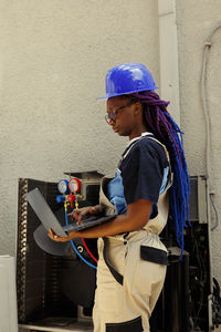 Portrait of man working at construction site