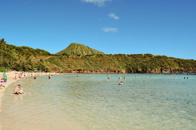 Scenic view of sea against clear blue sky