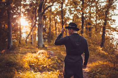 Man standing in the forest