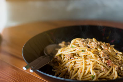 Close-up of noodles in bowl on table