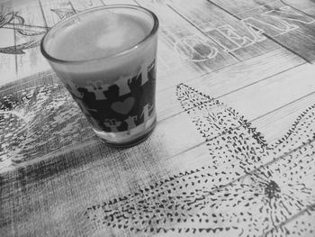 High angle view of coffee cup on table