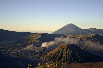 Scenic view of volcanic landscape against sky