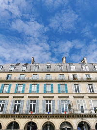 Typical architectural features of parisian buildings. stone facade with blu zinc plates roof