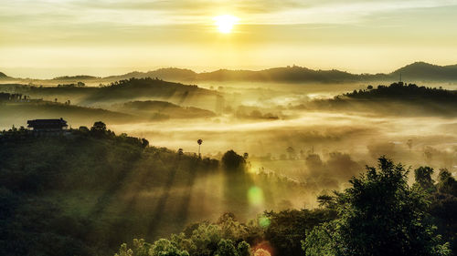 Scenic view of landscape against sky during sunset