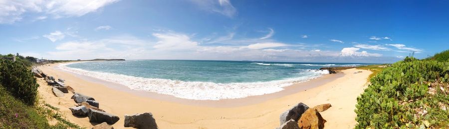 Panoramic view of beach against sky