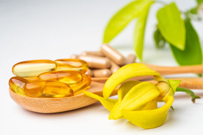 Close-up of yellow slices on table