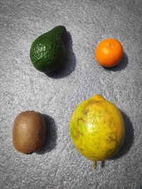 High angle view of oranges against white background