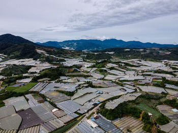 High angle view of greenhouse against sky