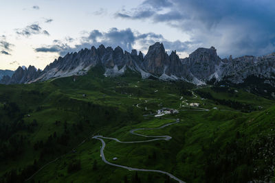 Scenic view of landscape and mountains against sky