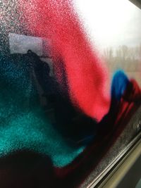 Close-up of red car window