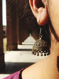 Close-up of woman wearing earring