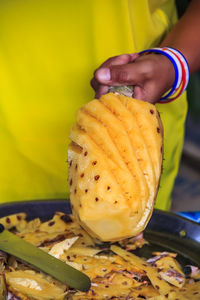 Midsection of woman holding food