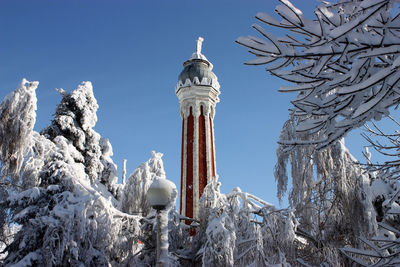 Low angle view of statue against sky