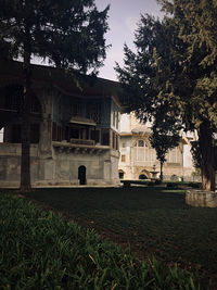 View of historical building in field