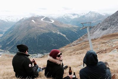 People on snow covered mountain