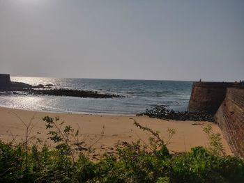 Scenic view of sea against clear sky