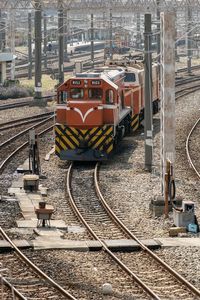 High angle view of train on railroad tracks in city