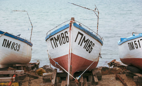 High angle view of boats moored at beach