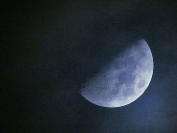 Low angle view of moon against the sky