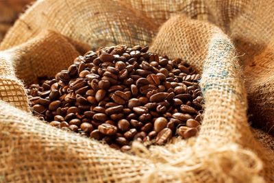 Close-up of coffee beans in sack