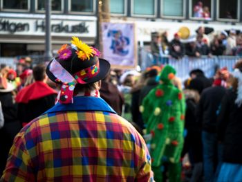 Rear view of people in traditional clothing