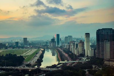 High angle view of buildings against sky during sunset