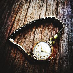 High angle view of clock on table