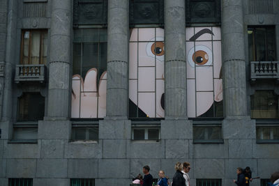 Group of people in front of building