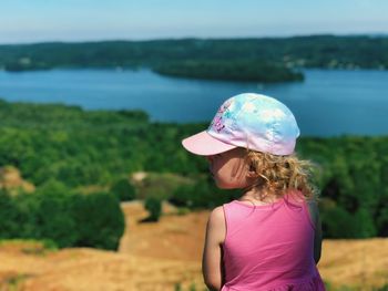 Rear view of woman looking at sea