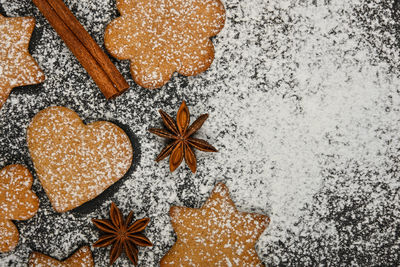 High angle view of cookies on snow during christmas