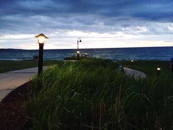 Scenic view of sea against cloudy sky