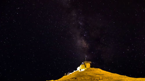 Low angle view of star field against sky at night