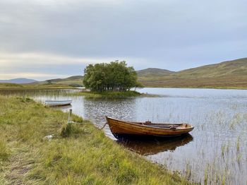 Fishing boats on island loch