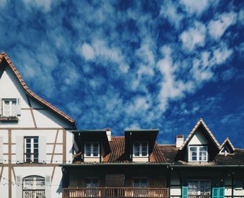 Low angle view of houses against sky