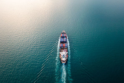 High angle view of ship sailing on sea