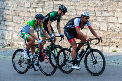 People riding bicycle