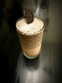 Close-up of oreo shake on table