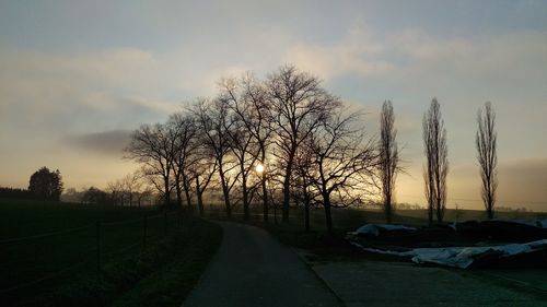 Empty road at sunset
