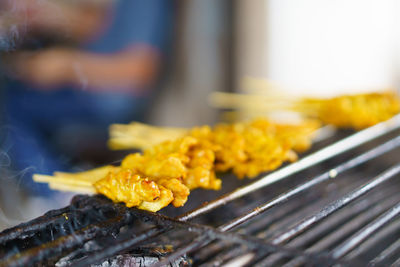 Close-up of meat on barbecue grill
