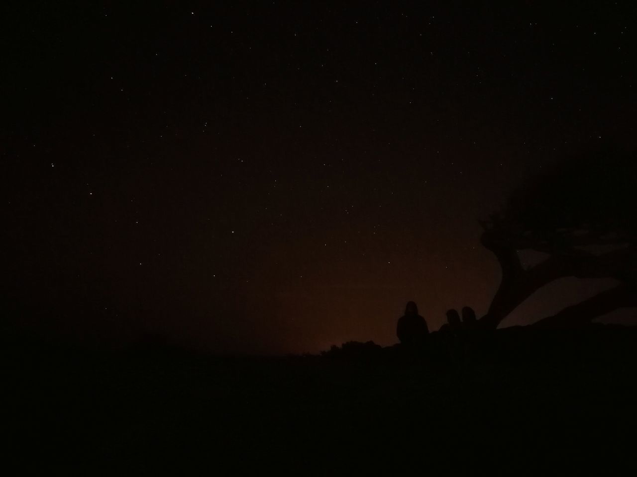 SILHOUETTE MAN AGAINST SKY AT NIGHT